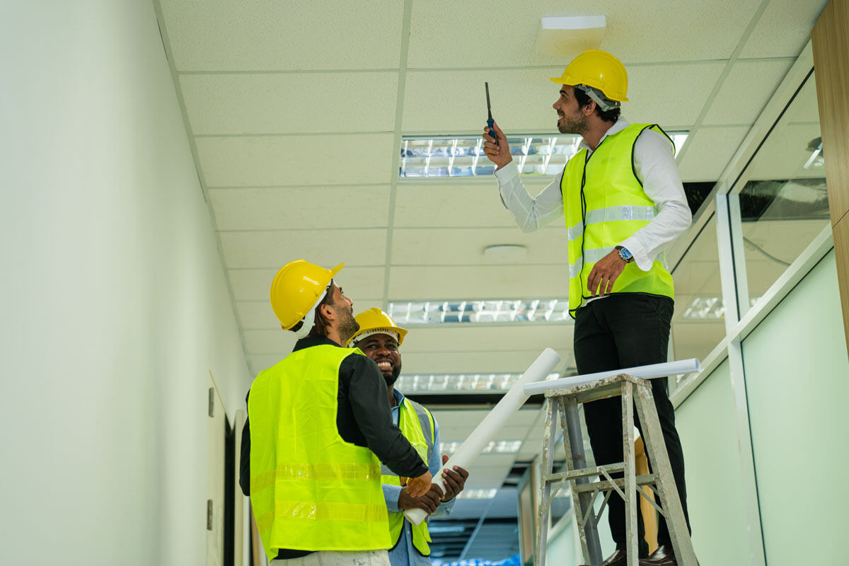 Facilities engineers inspecting a commercial building
